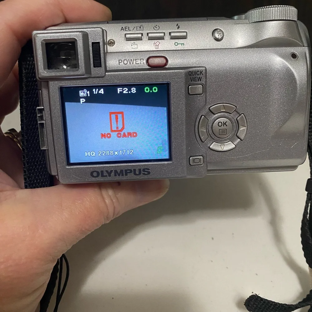 Olympus Silver Digital Camera with Charger